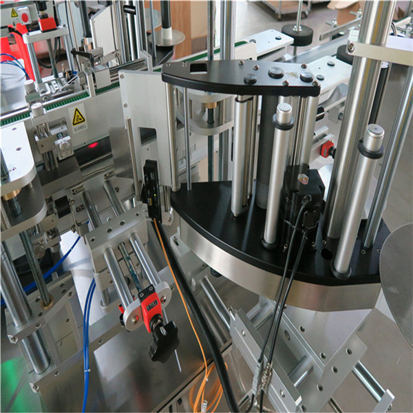 Samolepicí samolepka na oválný stroj na značení lahví